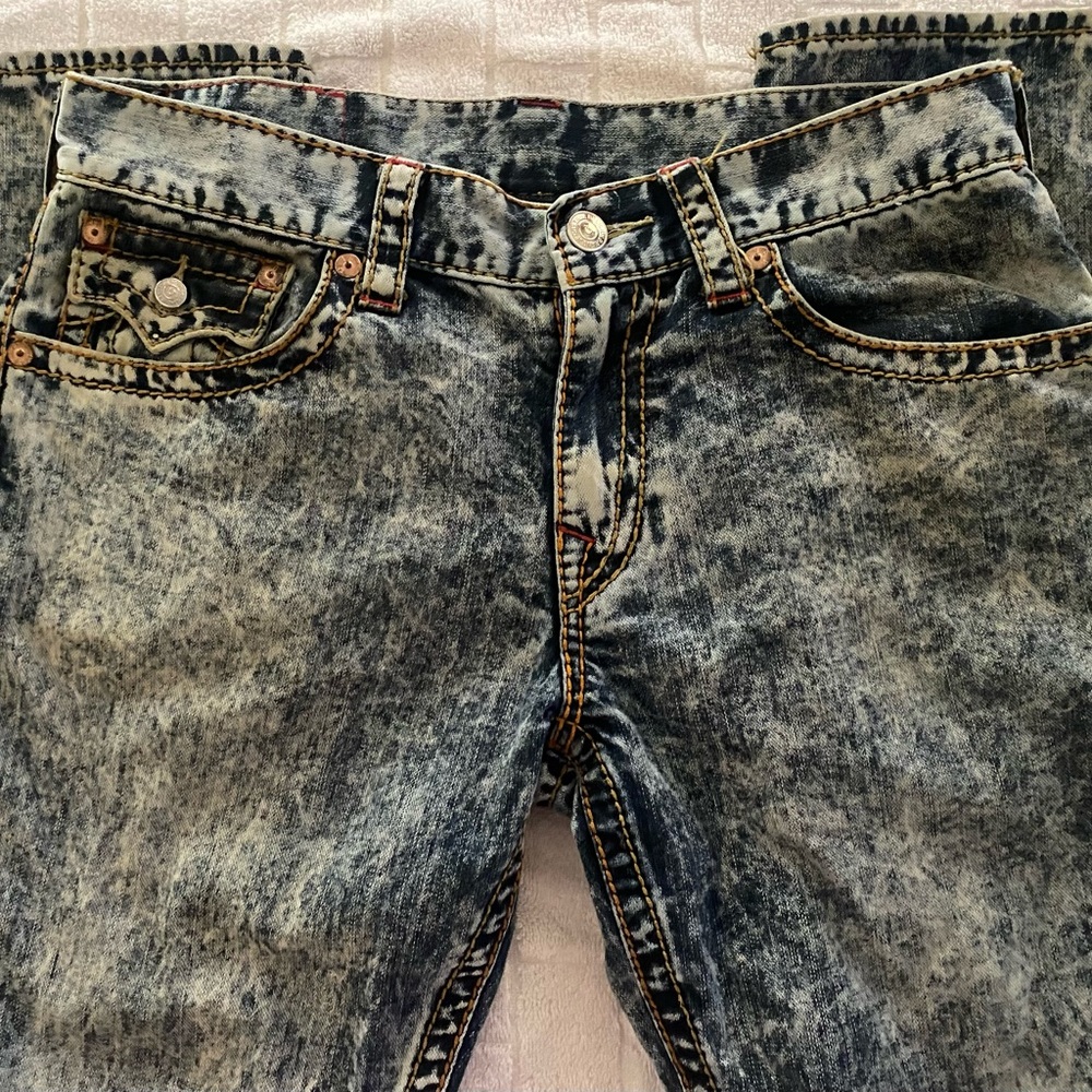 Men’s True Religion jeans.